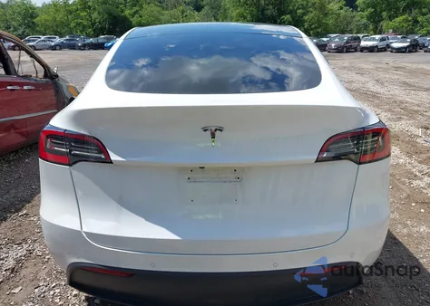 2021 Tesla Model Y Standard Range Rear-Wheel Drive from USA, damaged, VIN 5YJYGDEDXMF109655